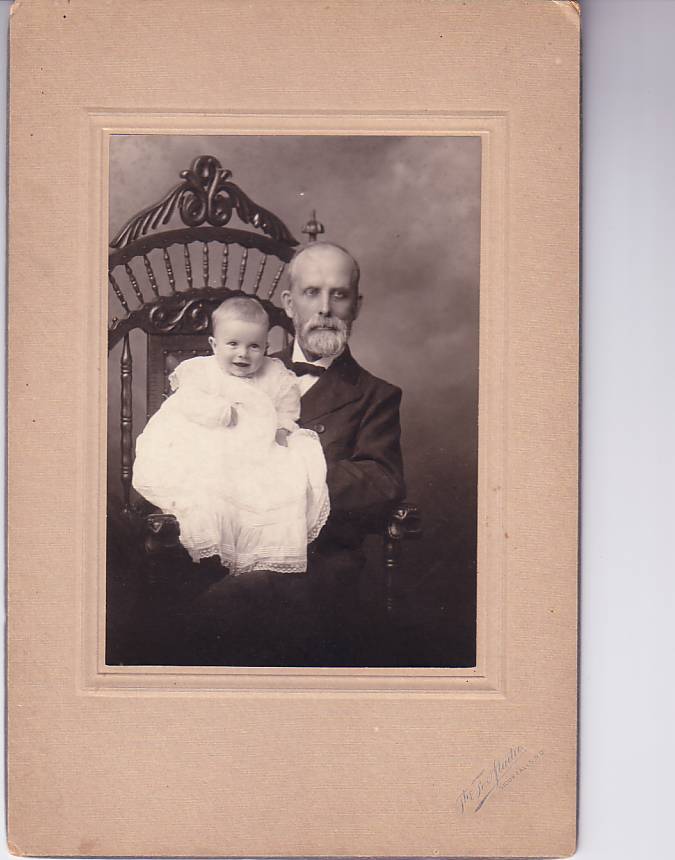 John Gates, Waterloo, Ia., with his grandsonJohn Carter Gates, 6 mo.,